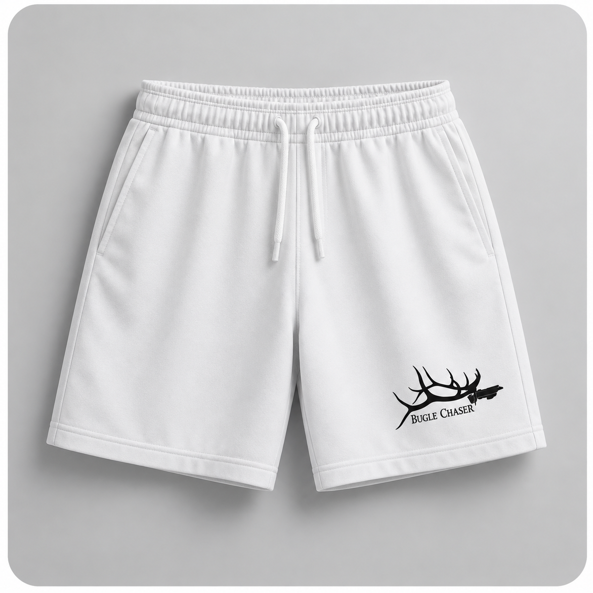 White athletic shorts with a black Bugle Chaser antler logo
