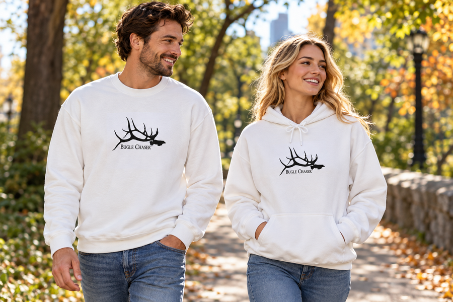 Illustrative outdoor styling scene with Bugle Chaser white crewneck and hoodie